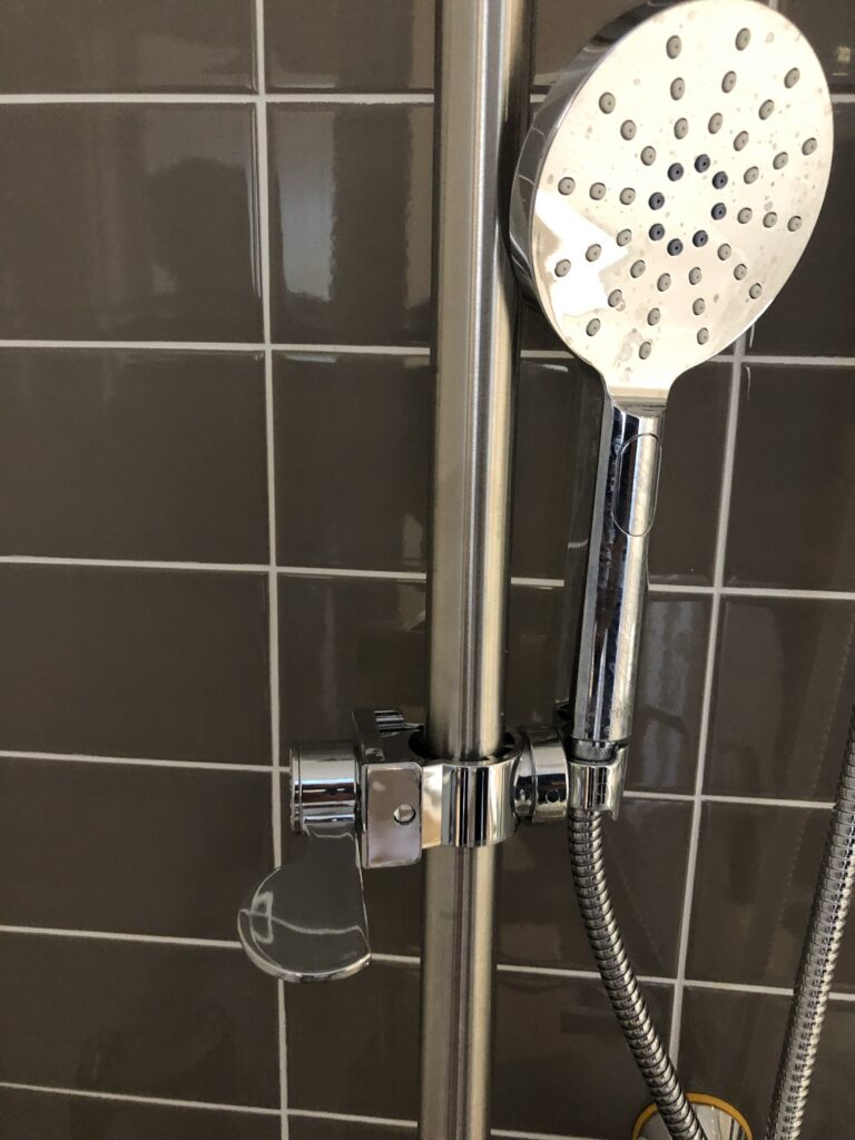 hand held shower showing the need for legionella treatment